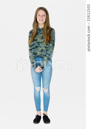 Teenage girl smiling casual studio portrait 31612503