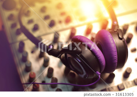 headphone on sound mixer in the recording studio. headphone on sound mixer in the recording studio. 31613305