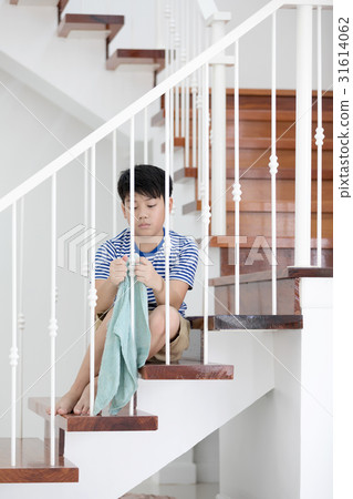 Asian child cleaning in the house Asian child cleaning in the house 31614062