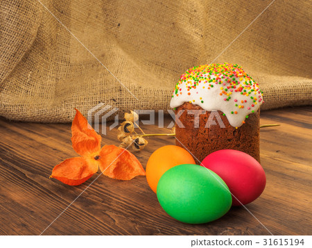 Easter cake and easter colored egg with dry flower 31615194
