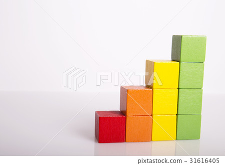 Stacks of multicolored toy blocks Stacks of multicolored toy blocks 31616405