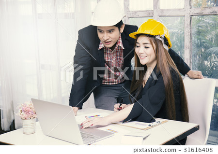 Engineers working on project Engineers working on project 31616408
