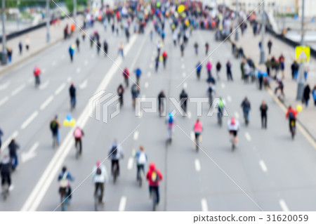Abstract blurred background of mass cycling Abstract blurred background of mass cycling 31620059