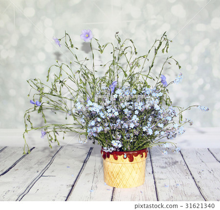 bouquet of wildflowers on a wooden table bouquet of wildflowers on a wooden table 31621340