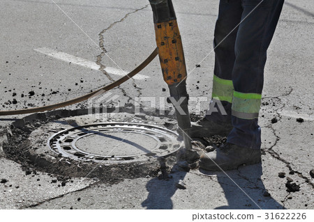 Asphalt demolishing, worker and jackhammer 31622226