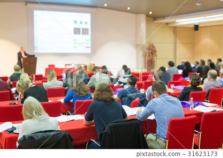Audience in lecture hall on scientific conference. 31623173