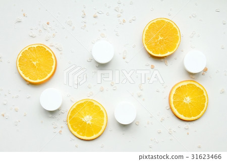 Cosmetic bottle containers with fresh orange slice Cosmetic bottle containers with fresh orange slice 31623466
