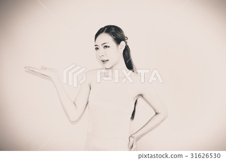 Beautiful asia woman show hand for point direction Beautiful asia woman show hand for point direction 31626530