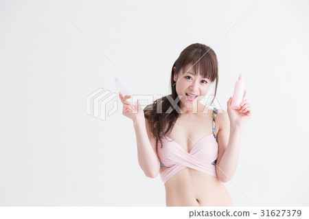 Women in swimwear · white back 31627379
