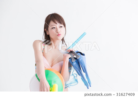 Women in swimwear · white back 31627409