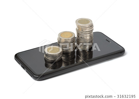 Coins stack on smart phone, Mobile payment concept Coins stack on smart phone, Mobile payment concept 31632195