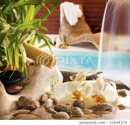 Spa concept with stones orchids waterfall in pool Spa concept with stones orchids waterfall in pool 31634174