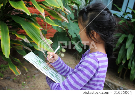 Asian children learning biology plant species. 31635004