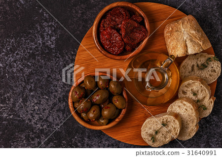 Fresh bread with snacks. 31640991