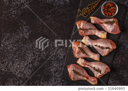 Raw chicken legs, top view. Raw chicken legs, top view. 31640993