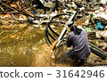 A worker is cutting steel with oxygen gas machine 31642946