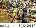 A worker is cutting steel with oxygen gas machine 31642947