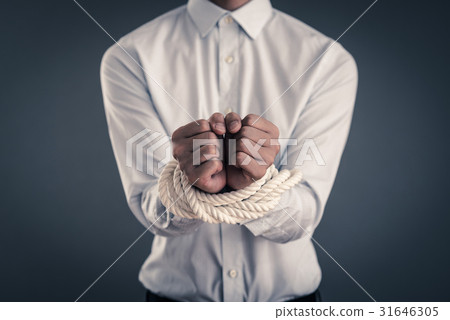 A businessman whose hand was tied at the rope 31646305