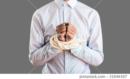 A businessman whose hand was tied at the rope 31646307
