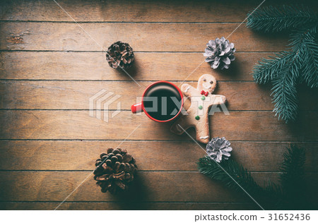 Cup of coffee and Christmas gingerbread man Cup of coffee and Christmas gingerbread man 31652436