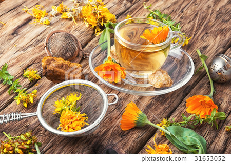 Herbal tea with calendula flowers Herbal tea with calendula flowers 31653052