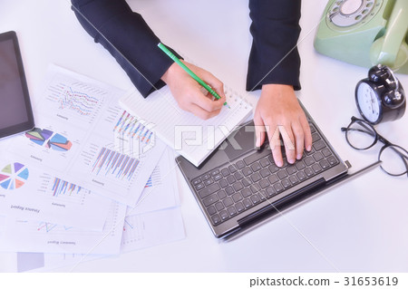 Businesswoman working at modern office. 31653619