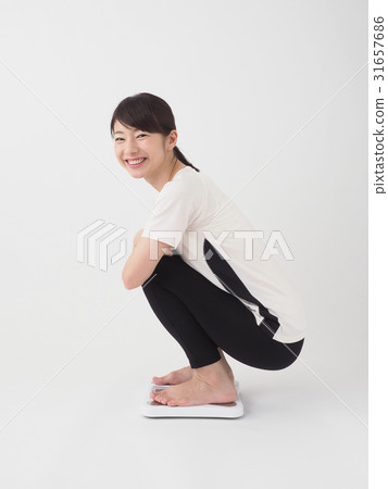 A woman who weighs with a smile 31657686
