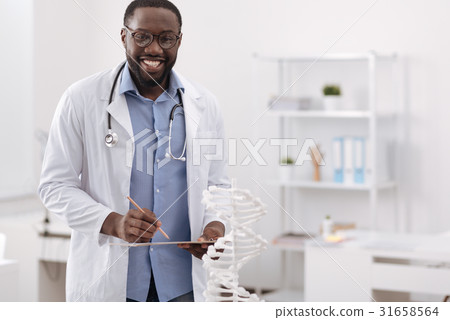 Happy joyful biologist looking at you 31658564