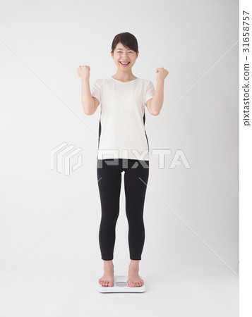 A woman who gains weight by gaining weight A woman who gains weight by gaining weight 31658757