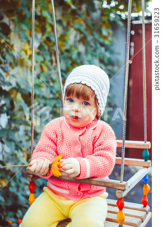 Child on the swing Child on the swing 31659223