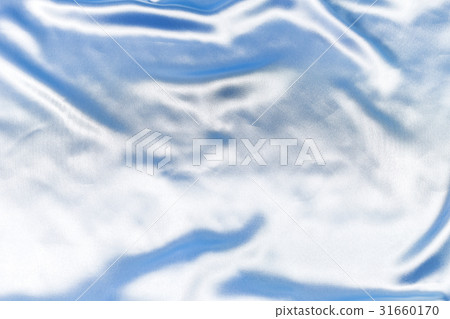 Wave on shiny blue fabric. Wave on shiny blue fabric. 31660170