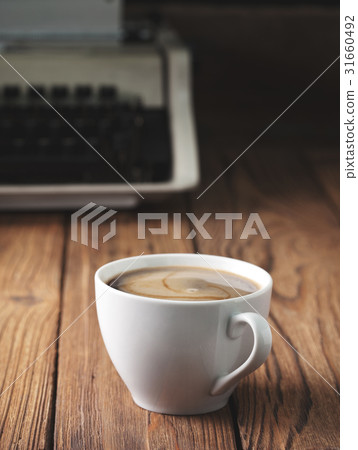 coffee and old typewriter 31660492