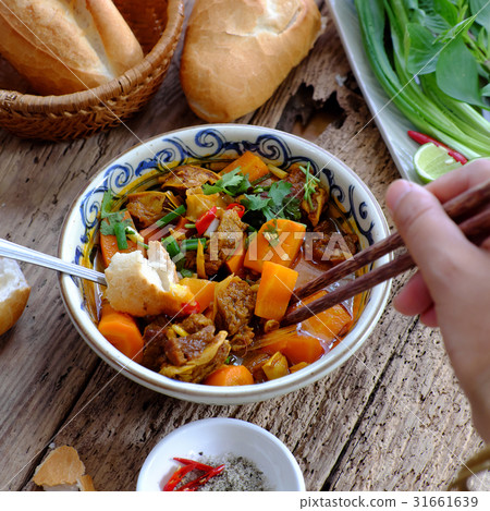 Vietnam food, bread with stewed beef Vietnam food, bread with stewed beef 31661639