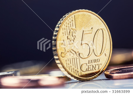 Fifty cent coin on the edge. Euro money currency. 31663899