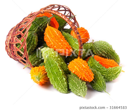 bitter melon or momordica in a wicker basket 31664583