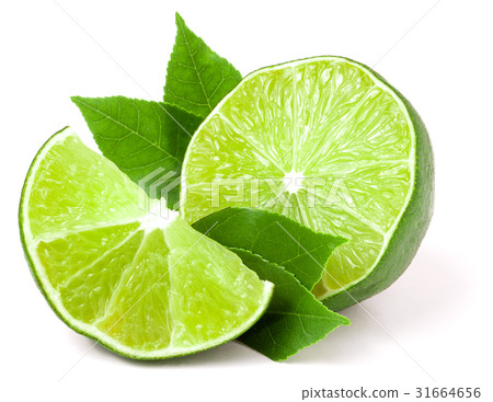 圖庫照片: lime with slices and leaf isolated on white