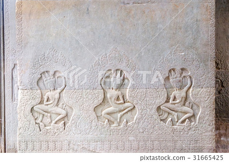 Khmer art carvings on the wall of Angkor Wat Khmer art carvings on the wall of Angkor Wat 31665425