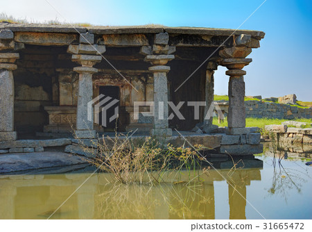 Ancient ruins on Hemakuta hill, Hampi, India 31665472
