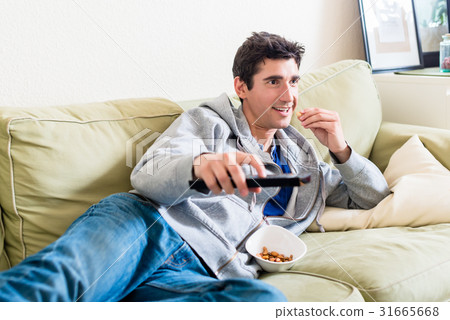 Funny young couple playing together a video game Funny young couple playing together a video game 31665668