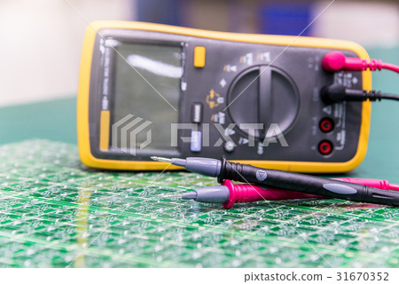 Digital multimeter on ESD table Digital multimeter on ESD table 31670352