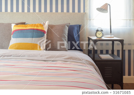 Colorful style bedding in modern bedroom interior 31671085