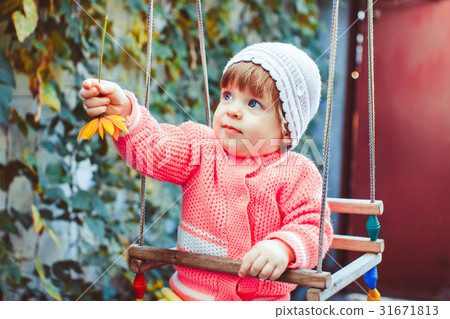 Child on the swing Child on the swing 31671813