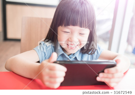 cute girl use phone 31672549