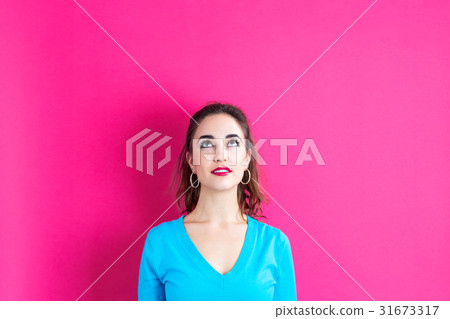 Young woman looking upward 31673317