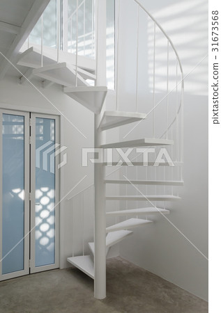 White spiral stair in modern room White spiral stair in modern room 31673568