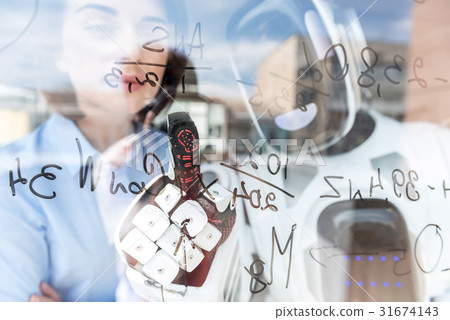 Pleasant colleagues are standing in office 31674143