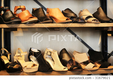 Women shoes on the shelves in the store 31679021