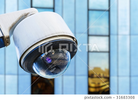 cctv security camera with building on background 31683308