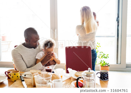 Young interracial family with little children 31684761