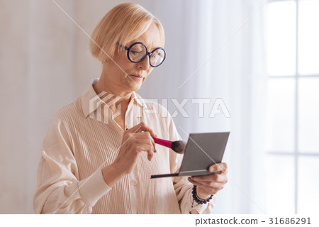 Old female trying to look nice. 31686291